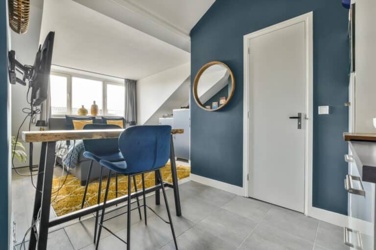 A small studio flat with furniture and fixtures in the concept of 'what factors influence the cost of a man and van service'.